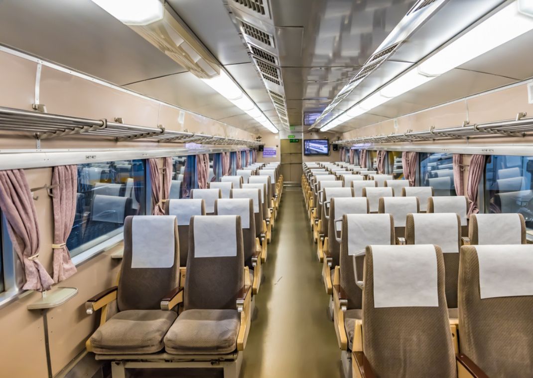 Empty carriage on Japanese bullet train showing the seat formation